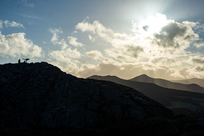 Scenic view of mountains against sky during sunset