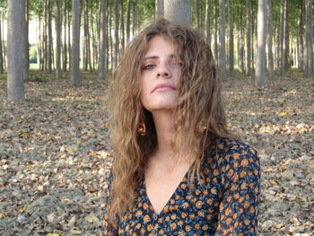 Portrait of teenage girl in forest