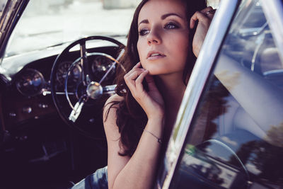 Portrait of woman in train