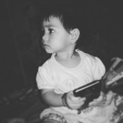 Close-up of cute girl playing