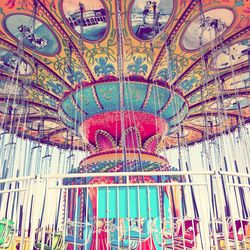 Low angle view of carousel in amusement park