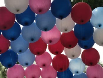 Low angle view of balloons hanging from ceiling