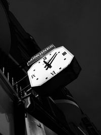 Low angle view of clock tower against the sky