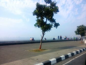 View of road against cloudy sky