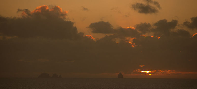 SCENIC VIEW OF SILHOUETTE LANDSCAPE AGAINST SKY DURING SUNSET