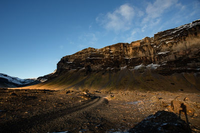 Panoramic view of rocky mountains against sky