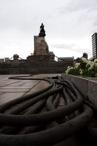 Statue of historic building against sky