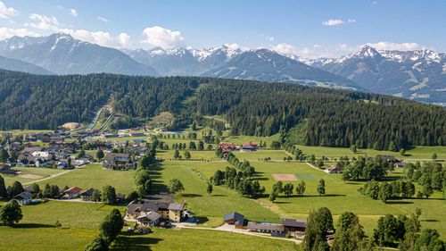 Scenic view of landscape and mountains against sky