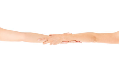 Midsection of people against white background