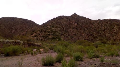 Scenic view of mountain range against sky