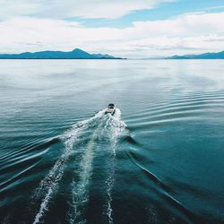 Boat in sea against sky