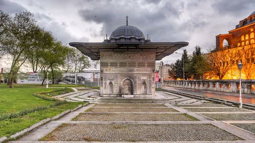 View of historical building against cloudy sky