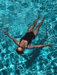 High angle view of person swimming in pool