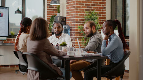 Business colleagues working at office