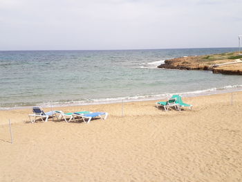 Scenic view of beach against sky