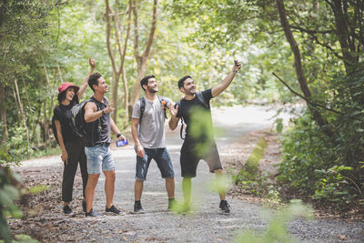 Friends enjoying in forest