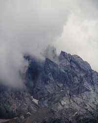 Scenic view of volcanic mountain against sky