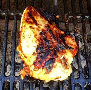 Close-up of meat on barbecue grill