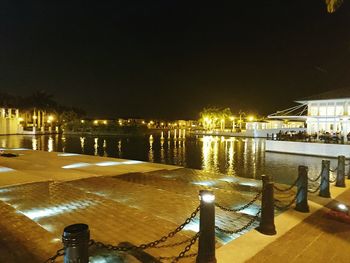 Reflection of illuminated buildings in water