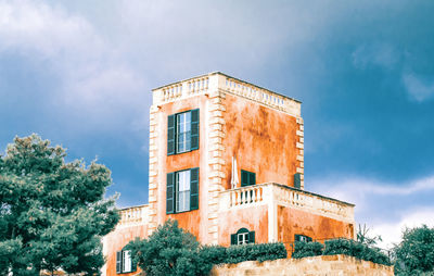 Low angle view of historical building against sky