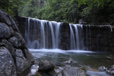 View of waterfall in forest