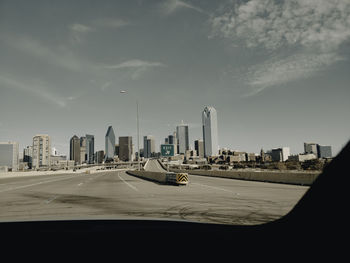 Panoramic view of city buildings against sky of downtown dallas skyline 