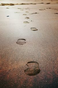 Close-up of sand at beach