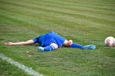 Injured player lying on field