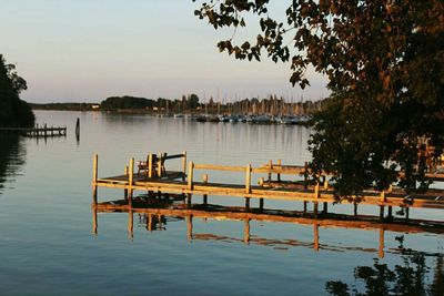 Scenic view of calm lake against sky