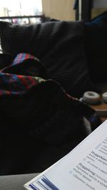 Close-up of book on table at home