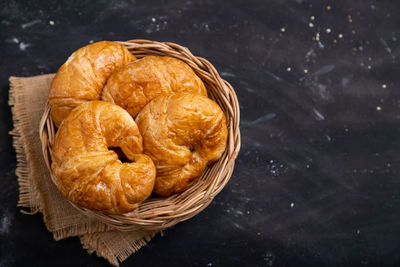 High angle view of bread in basket on table