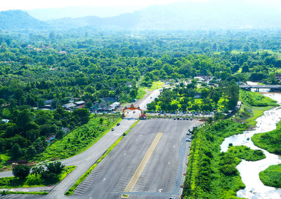 High angle view of road amidst trees