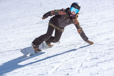 Full length of child on snow