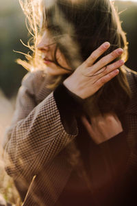 Portrait of a young woman on a sunny day in autumn