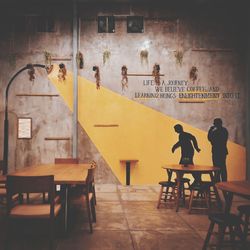 People sitting on table in cafe