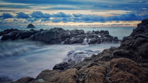 Scenic view of sea against sky during sunset