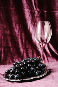 Close-up of wineglasses on table