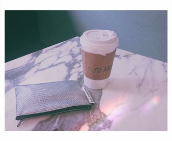 High angle view of coffee cup on table