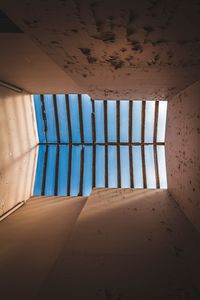 Directly below shot of window in abandoned building