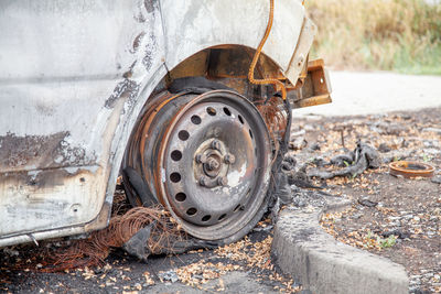 Minibus after a fire, burnt body and interior of the car. burnt rusty car after fire or accident