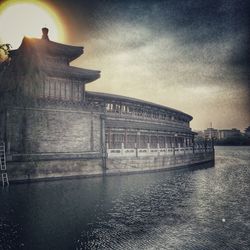 View of historic building against cloudy sky