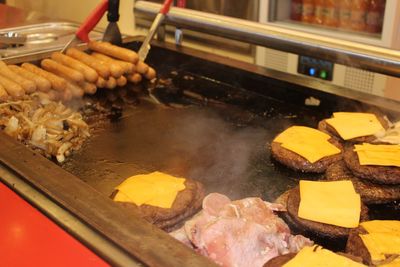 High angle view of meat on barbecue grill