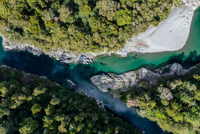 High angle view of rocks and sea