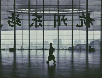 Reflection of woman in water