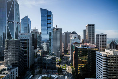 Modern buildings in city against sky