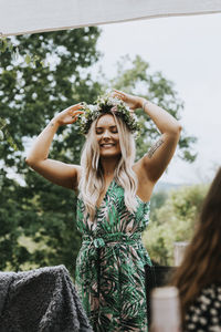 Woman wearing flower wreath