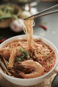 Close-up of noodles served in bowl on table