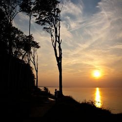 Scenic view of sea at sunset