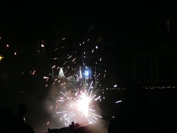 Firework display at night