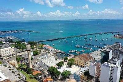 High angle view of swimming pool by sea against sky